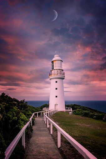 This photograph shows the lighthouse in Sassnitz, Germany at sunset