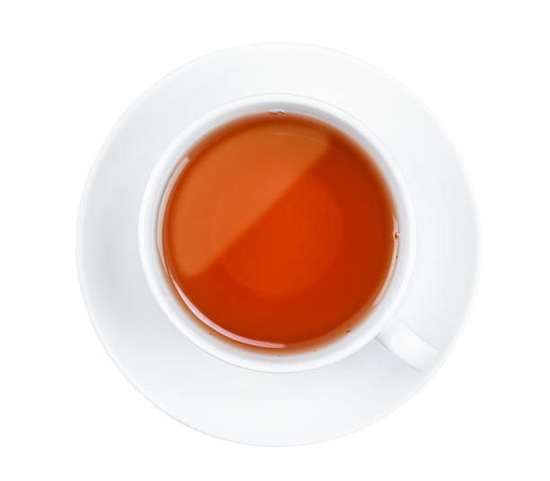 istock white mug with tea on a saucer 1323409146