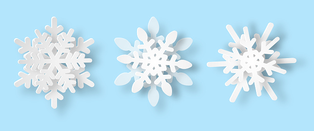 Snowflakes set of 3 white New Year paper cut 3d origami with shadow on blue background. Christmas design elements. Greetings card. Background snowflake for winter and christmas theme. Poster, banner