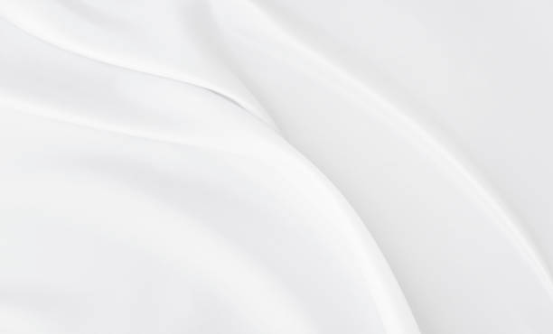 istock White gray satin texture that is white silver fabric silk background with beautiful soft blur pattern natural. 1323413059