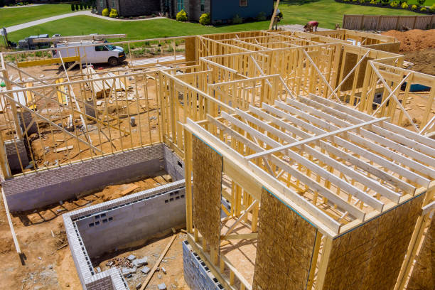 istock New home construction framing of a house under construction 1323419264