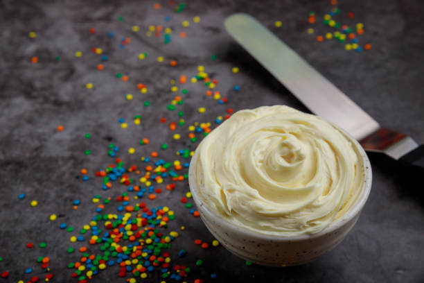 istock Homemade whipped cream in a bowl with spatula. 1323419983