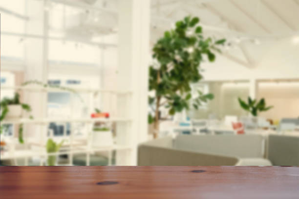 Rows of modern chairs lined up and table near window
