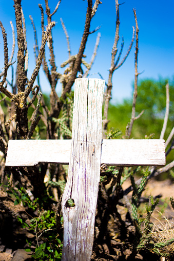 Rustic Old Wood Cross Gravesite and Cactus, Southwest US