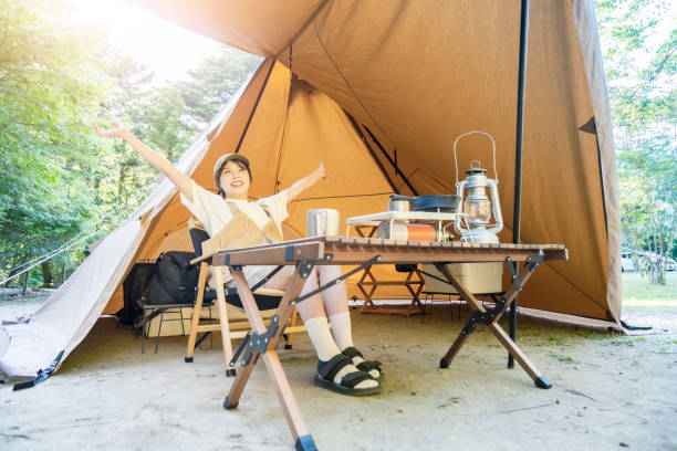 istock A woman enjoying a solo camp 1323427357