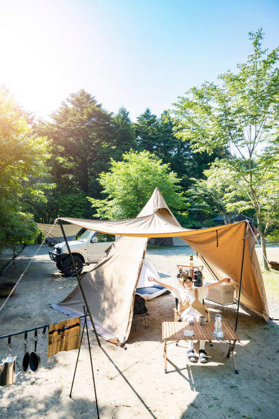 A woman enjoying a solo camp