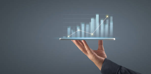 istock Plan graph growth increase of chart positive indicators in his business on tablet 1323427612