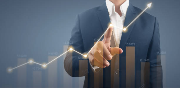 istock Businessman plan graph growth increase of chart positive indicators in his business 1323428228
