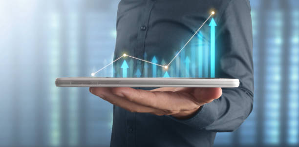 istock Plan graph growth increase of chart positive indicators in his business on tablet 1323428245