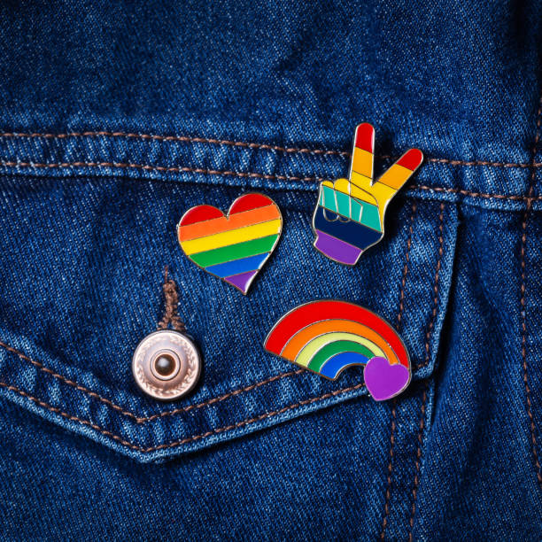 istock Rainbow lgbtq flag badges against denim background, pride month 1323434204