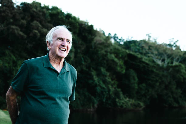 istock Portrait of an elderly man laughing with happiness 1323436033