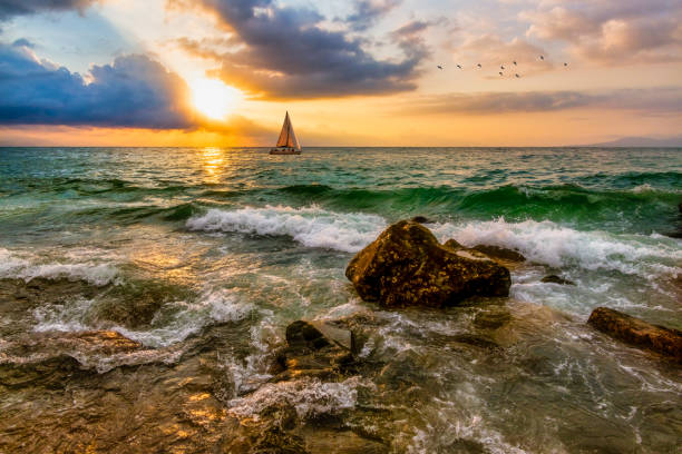 istock Sunset Ocean Sailboat 1323437974