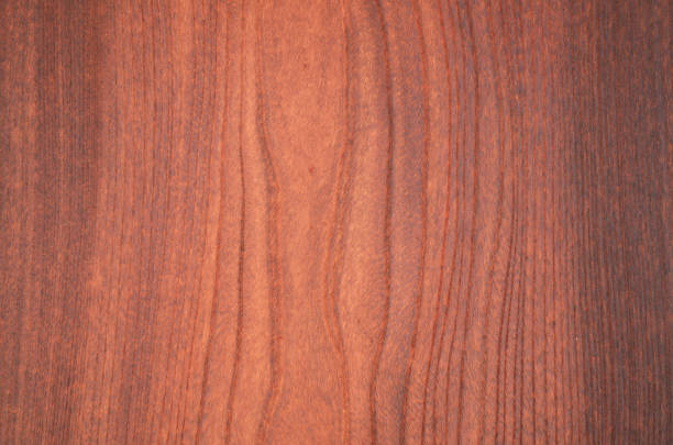 istock Reddish brown wood texture background. Elegant wood grain facades. 1323442186