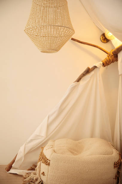 istock A terapy room subtly decorated with cushions, curtains and lights. 1323444679