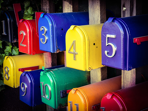 Two Colorful Old-Fashioned Rural US Mailboxes Close-Up. Shot in Santa Fe, NM.