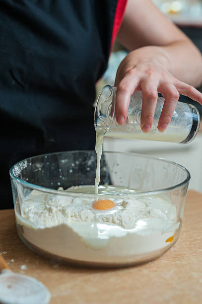 istock A Woman is Mixing Ingredients for a Meal. 1323449710