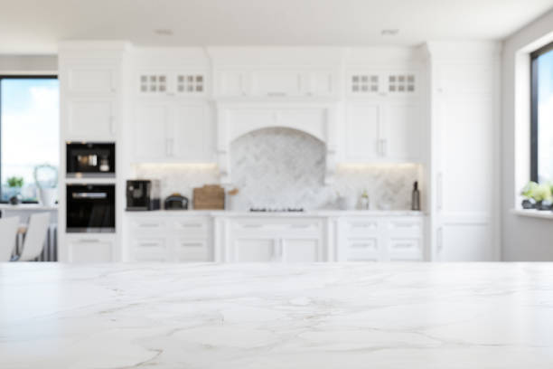 Empty White Marble Kitchen Countertop Empty white marble kitchen countertop with copyspace. Focus on foreground. kitchen counter stock pictures, royalty-free photos & images