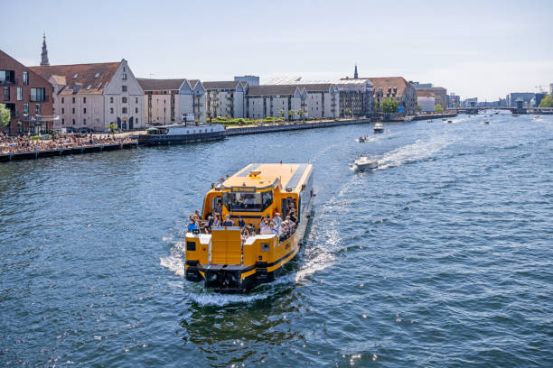 Electric passenger vehicle in Copenhagen harbor - this is a part of bus system in Copenhagen and the cost of a ticket is the same as in the ordinary busses. There are a couple of lines covering the most of the harbor area