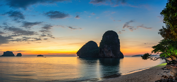 Tropical islands sunset view with ocean sea water at Phra Nang Cave Beach, Krabi Thailand nature landscape panorama