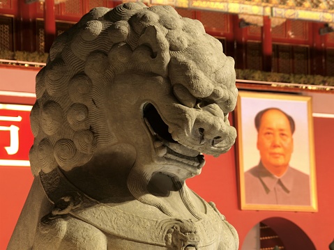 A stone lion guarding the Forbidden City.