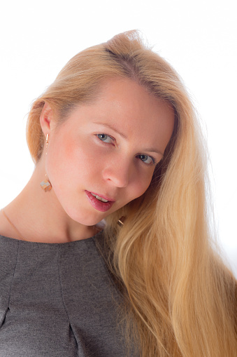 Portrait of young woman, female with long blond hair