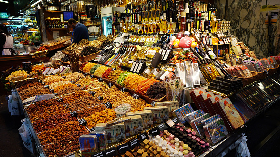 Barcelona, Spain- Jan 5, 2016: Colorful candy and drinks in the famous La Boqueria market, next to Les Rambles in Barcelona, Catalonia, Spain