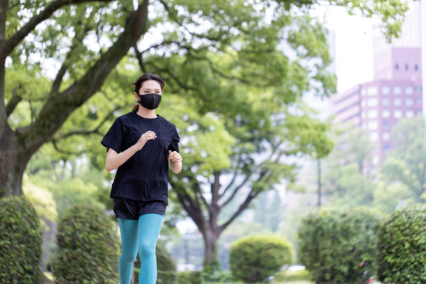 istock A woman running 1323468180