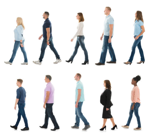 istock Group Of People Walking In Line 1323470091