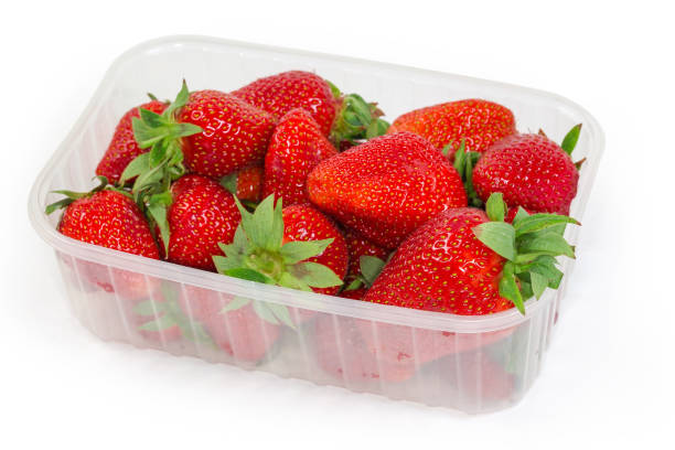 istock Fresh strawberries in food container on white background, close-up 1323470280