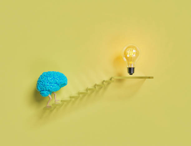 istock brain climbing stairs to a light bulb 1323470451