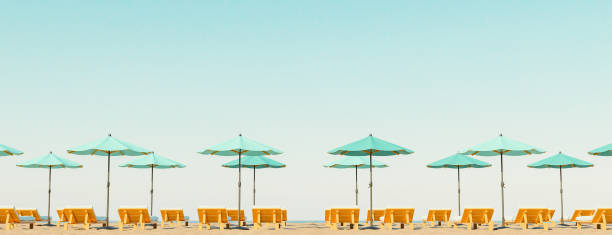 The sun beds on a beach near summer mediterranean resort in  Turkey.