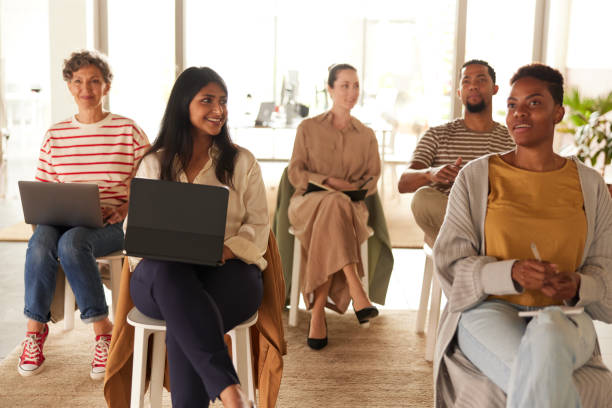 istock Small audience listening to a seminar 1323473029