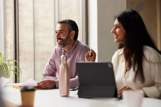 istock A startup business meeting around a conference table. 1323473343