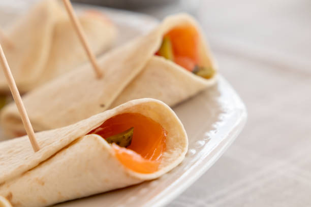 istock Pita rolls with smoked salmon and pickles 1323473415