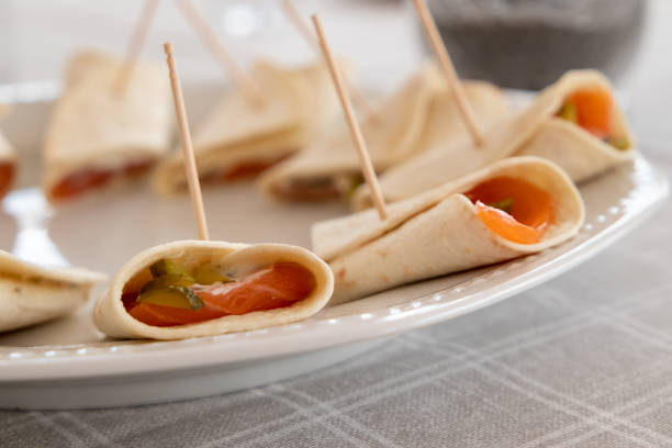 istock Pita rolls with smoked salmon and pickles 1323473427