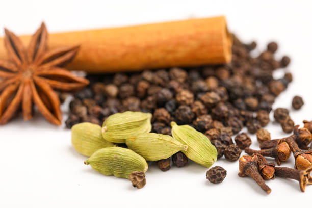 Indian spices and herbs on white background.