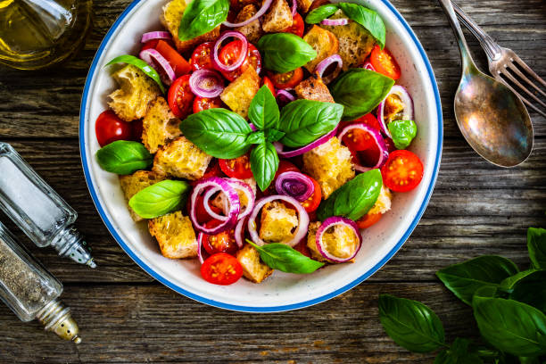 istock Classic panzanella salad on wooden board 1323476649
