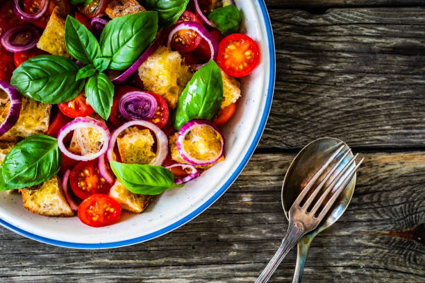 Classic panzanella salad on wooden board