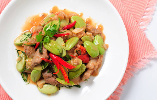 istock Deep fried pork with Bitter bean shrimp paste local delicious from southern Thailand. 1323476908