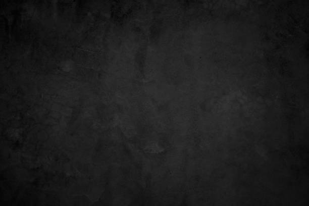 istock Close up retro plain dark black cement & concrete wall background texture for show or advertise or promote product and content on display and web design element concept decor. 1323480983