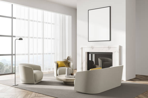 istock White living room interior with fireplace, seats and window, mockup poster 1323484071