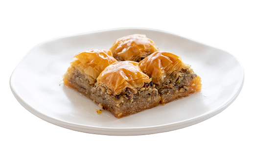 Baklava with walnuts isolated on a white background.