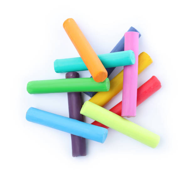 istock Many different colorful plasticine pieces on white background, top view 1323484128