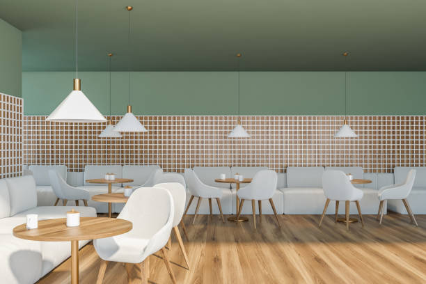 istock Modern cafe interior with wooden table and chairs with sofa 1323485204