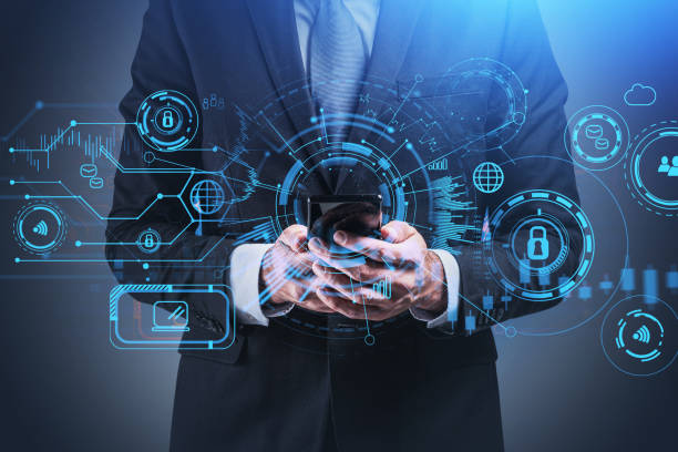 istock Businessman with smart phone surrounded by hologram and digital interface 1323486340