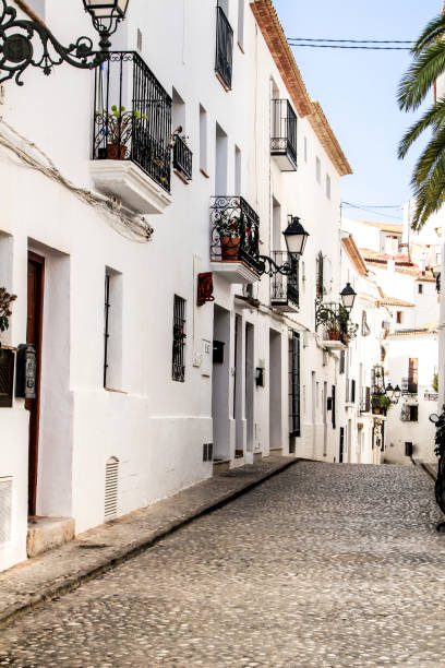 istock Narrow streets and whitewashed facades in Altea village 1323488018