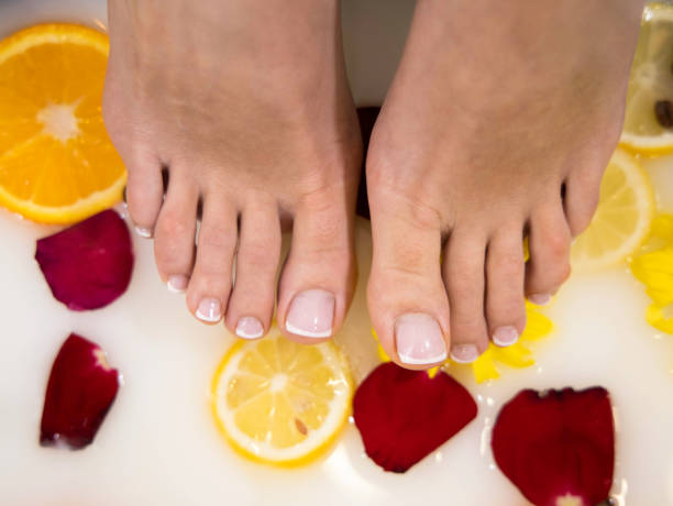 Spa treatment and product for woman feet stock photo