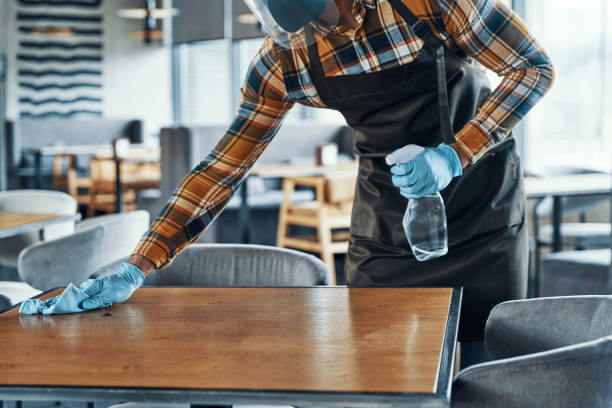 istock Close up of man in protective gloves 1323495617
