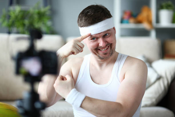 istock Close up of handsome man that shooting video 1323496613