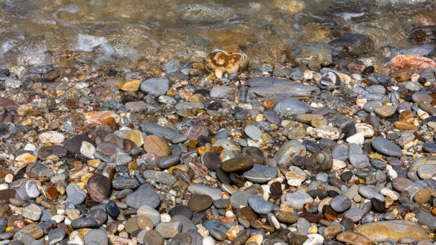 istock Holiday, rocky beach, and blue sky 1323498133